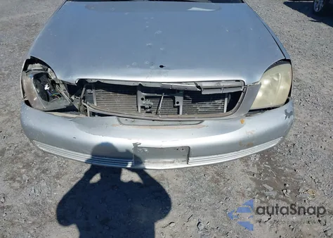 2003 Cadillac Deville Standard z USA, uszkodzony, nr VIN 1G6KD54Y03U158171